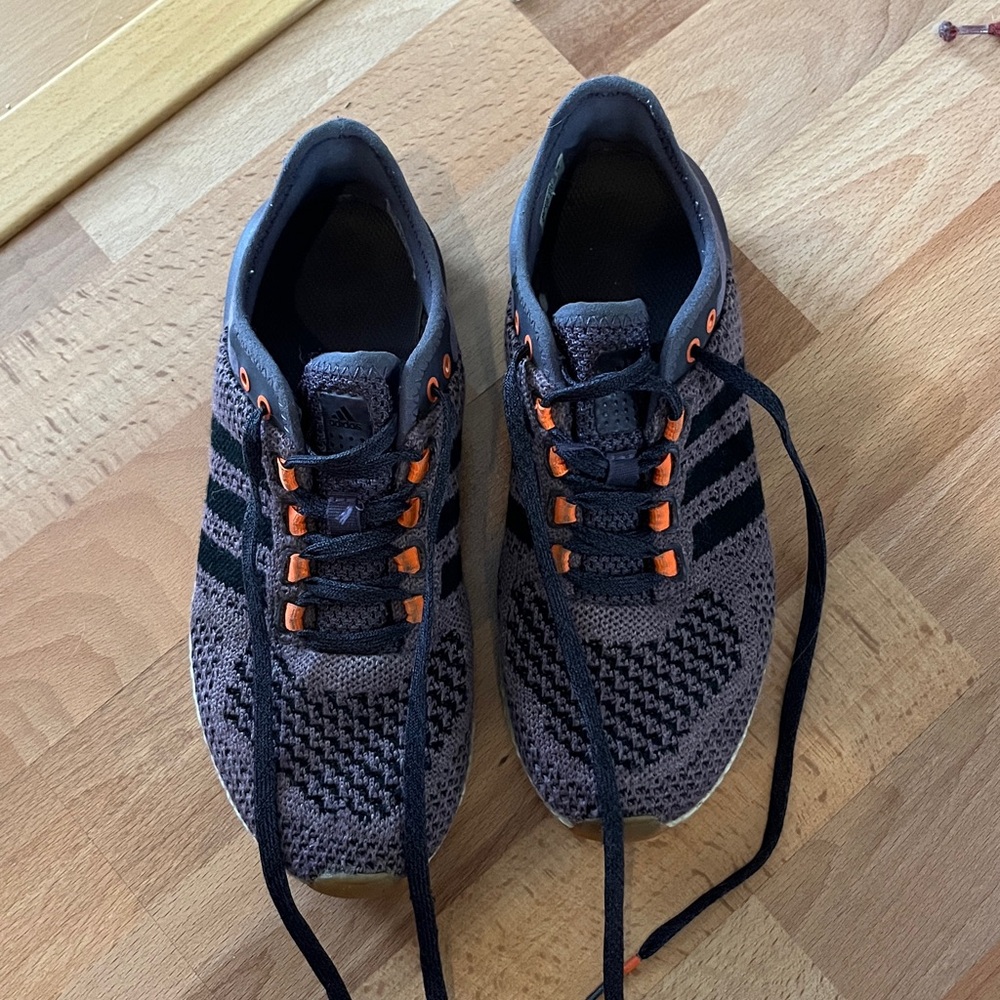 Adidas purple and black sneakers. Cosmic boost.